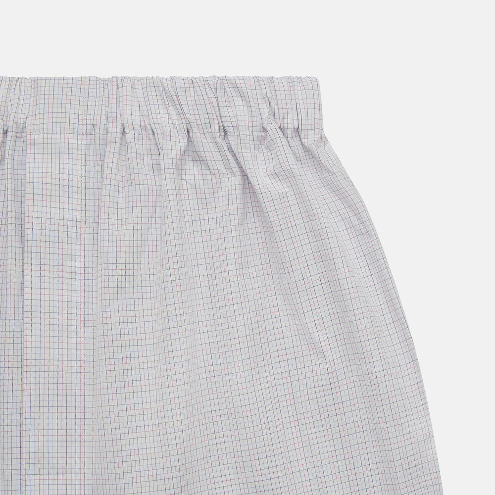 Turnbull & Asser Blue Multi Check Cotton Godfrey Boxer Shorts feature a relaxed fit, elastic waistband, and luxury design—men’s essentials laid flat on a white background.