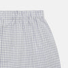 View 2 of product Turnbull & Asser White and Blue Check Cotton Godfrey Boxer Shorts: loose-fitting luxury cotton boxers with a blue check pattern and elastic waistband, shown on a plain white background.