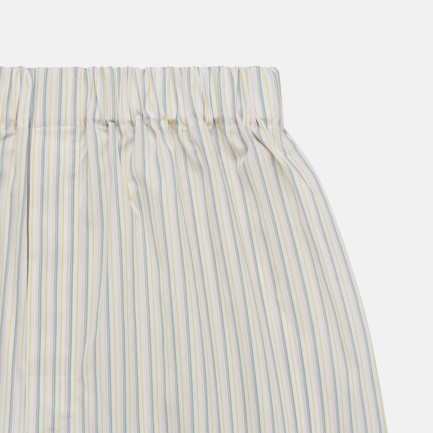 View 2 of product Turnbull & Asser Yellow and Green Stripe Godfrey Boxer Shorts, crafted from soft cotton with an elasticated waistband, are displayed flat on a light gray background.