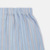 View 2 of product Turnbull & Asser Pale Blue Multi Striped Cotton Godfrey Boxer Shorts, featuring an elastic waistband and vertical white and navy stripes, laid flat on a plain white background.