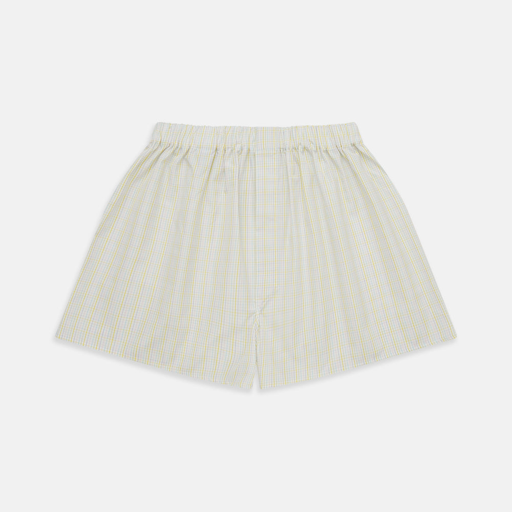 Turnbull & Asser Yellow Multi Check Godfrey Boxer Shorts, crafted from soft cotton with an elastic waistband, feature a loose fit and plaid design, shown on a plain white background.