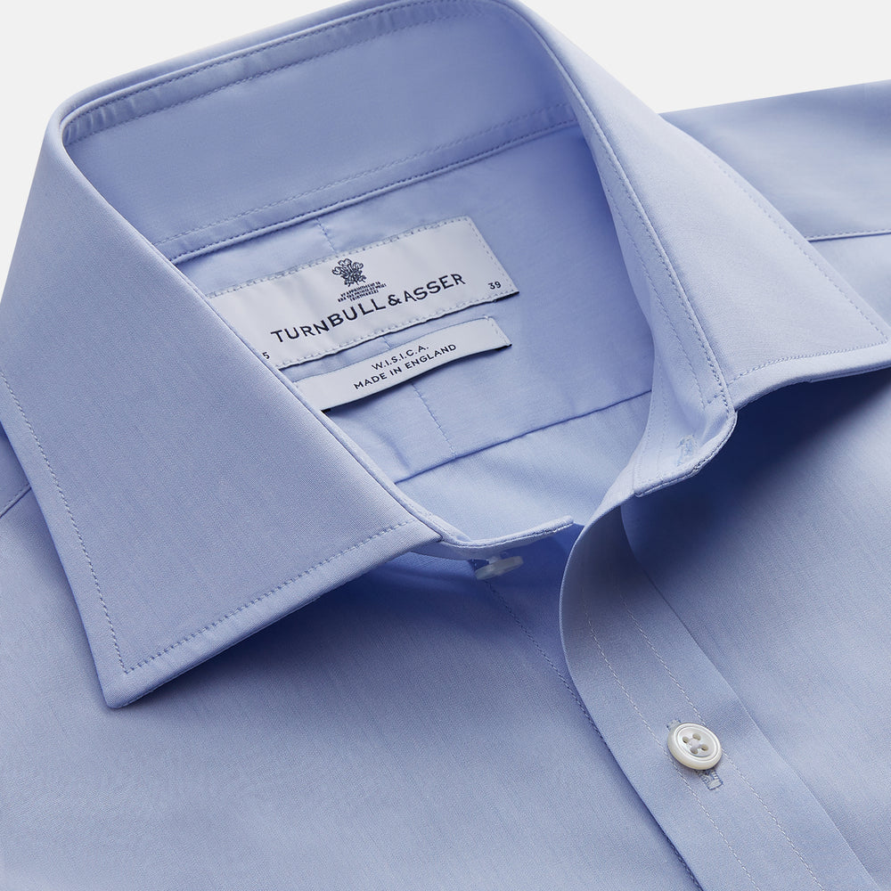The Turnbull & Asser DR. NO Pale Blue West Indian Sea Island Cotton Shirt features a signature DR. NO collar and cuff, as seen on James Bond, and is displayed on a white background.