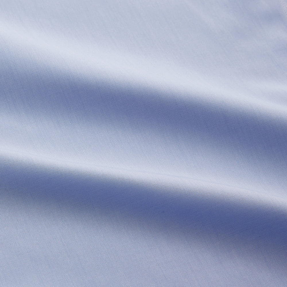 The Turnbull & Asser DR. NO Pale Blue West Indian Sea Island Cotton Shirt features a signature DR. NO collar and cuff, as seen on James Bond, and is displayed on a white background.