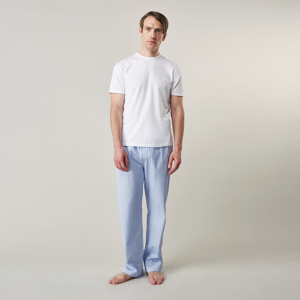 The Turnbull & Asser White Davey Cotton T-Shirt is shown on a white background. Crafted from fine-gauge jersey, it features short sleeves, a classic crew neck, and a clean front with no visible logos or designs.