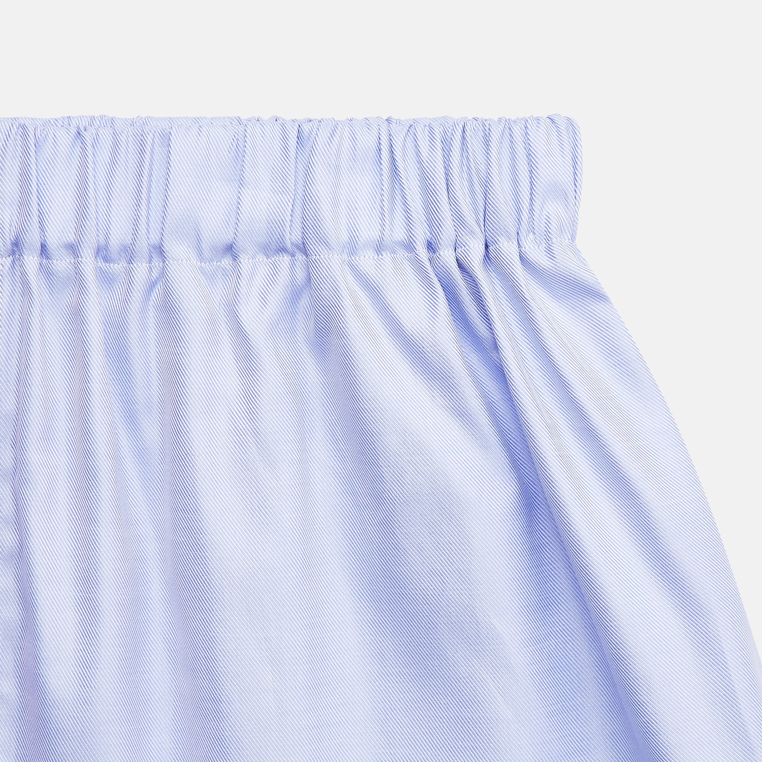 View 2 of product Turnbull & Asser Blue Sea Island Quality Cotton Twill Boxer Shorts for men, featuring an elastic waistband, shown flat on a white background.