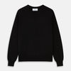 View 1 of product The Turnbull & Asser Black Crew Neck Cashmere Jumper is shown laid flat on a white background, featuring ribbed cuffs and hem with a small white label inside the collar.