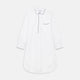 The Turnbull & Asser White Piped Cotton Nightshirt features black piping on the collar, chest pocket, and cuffs, plus a curved hem and loose-fitting sleeves gathered at the wrists for a classic look.