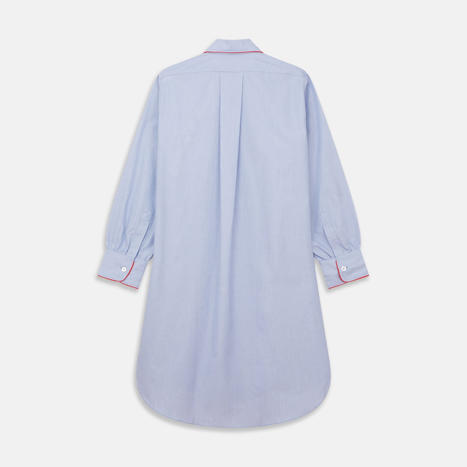 View 5 of product The Blue Piped End-on-End Cotton Nightshirt by Turnbull & Asser features light blue cotton, red piped accents, a chest pocket, high-low hem, and half-button placket—luxurious nightwear inspired by classic nightshirt style.