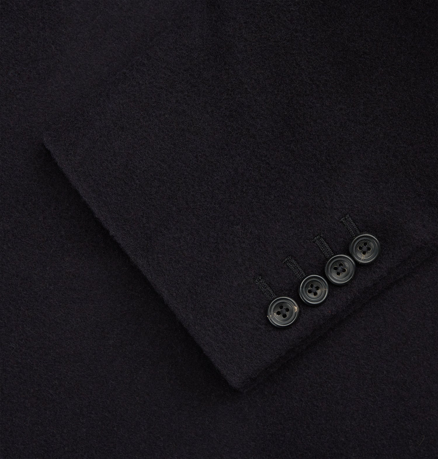 View 4 of product The Turnbull & Asser Navy Cashmere Joseph Overcoat features notched lapels, three front pockets, buttoned cuffs, and a hidden button closure—an essential men’s outerwear piece shown against a plain white background.