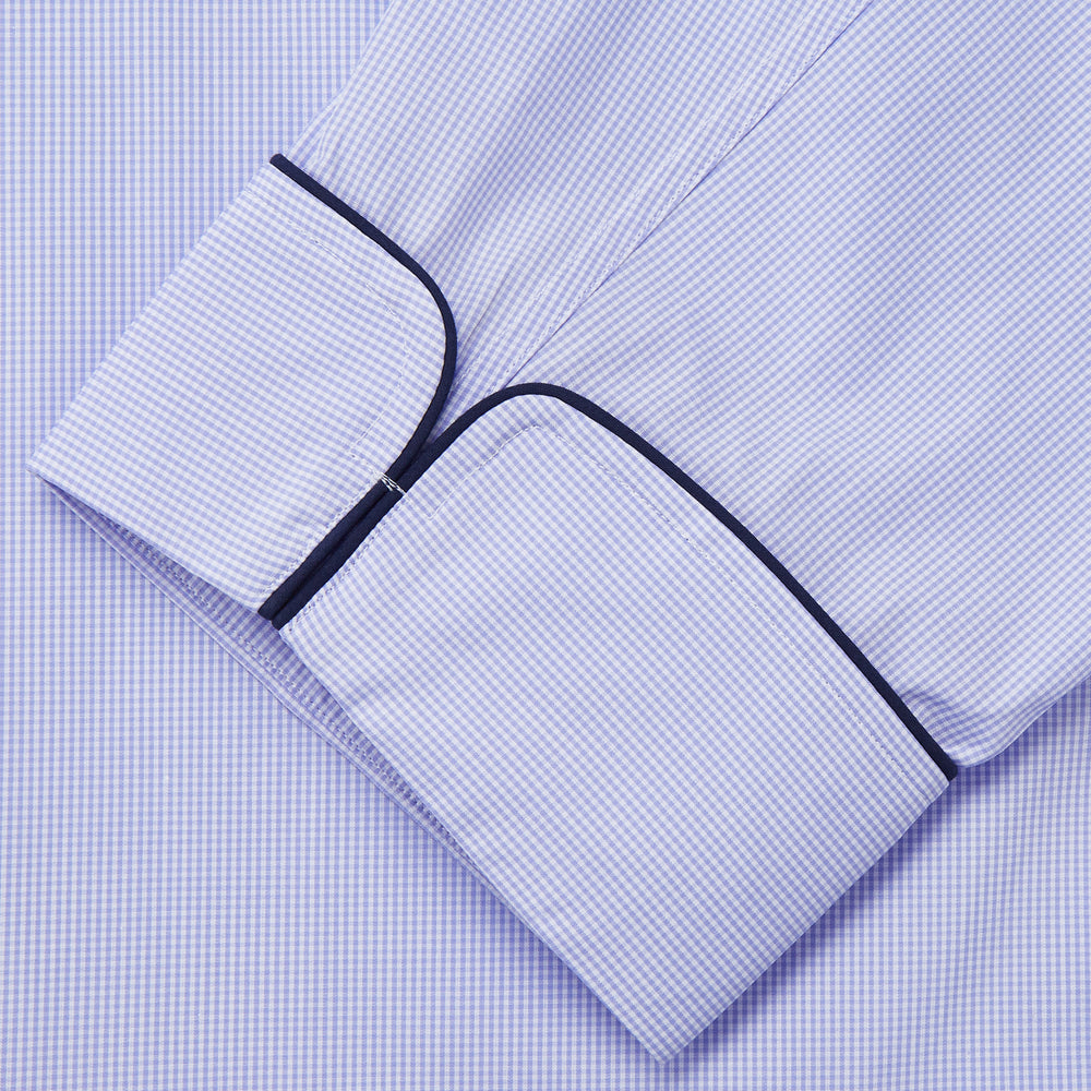 Turnbull & Asser's Blue Fine Check Piped Sea Island Quality Cotton Pyjama Set features white buttons, black piping on the collar, cuffs, and pocket, with matching drawstring pants—displayed flat on a white background.