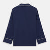 View 8 of product The Women's Harriet Navy Silk Pyjama Set by Turnbull & Asser features a long-sleeve, button-up top with white piping and chest pocket, plus matching drawstring pants—luxurious sleepwear displayed on a white background.