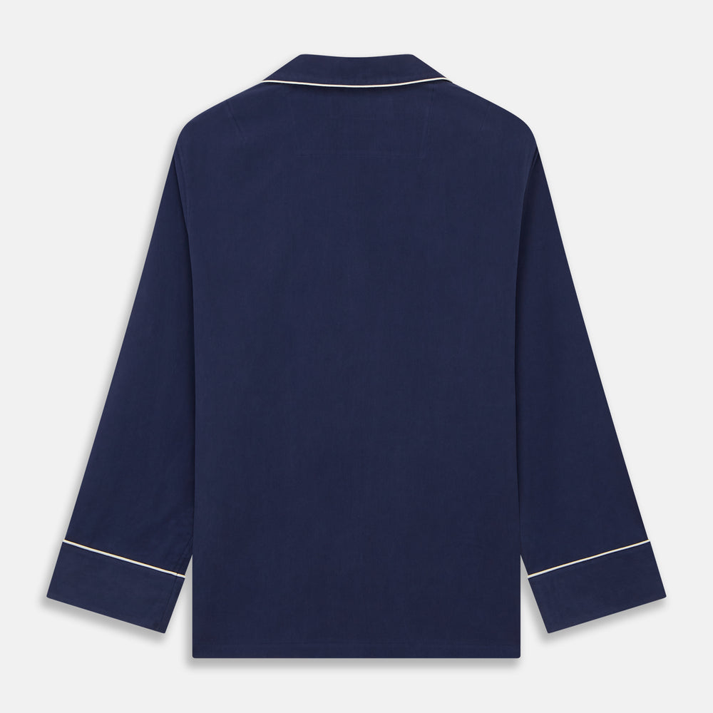 The Women's Harriet Navy Silk Pyjama Set by Turnbull & Asser features a long-sleeve, button-up top with white piping and chest pocket, plus matching drawstring pants—luxurious sleepwear displayed on a white background.