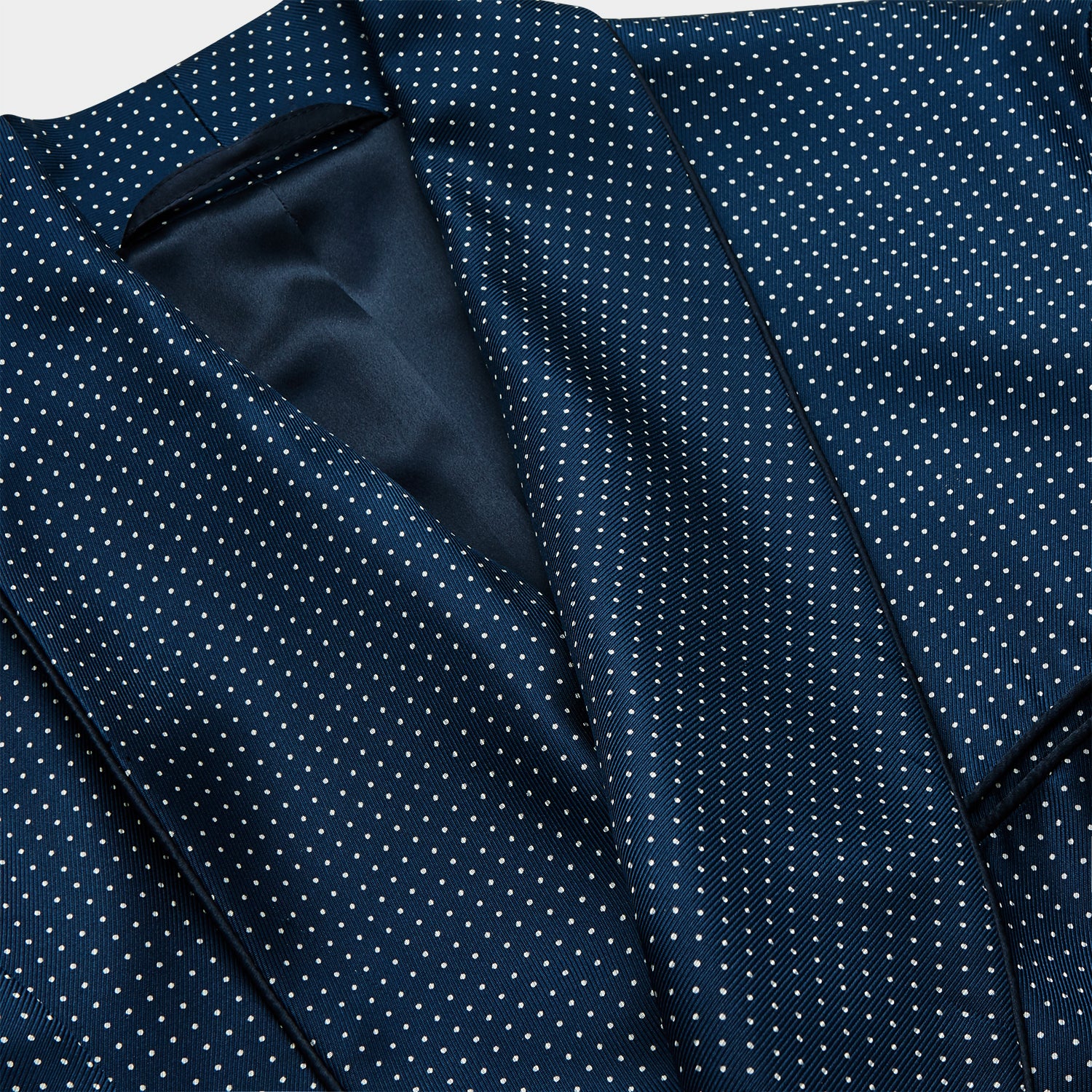 View 2 of product Experience luxurious nightwear with the Turnbull & Asser Navy Piped Silk Spot Gown, featuring elegant white dots for a timeless look.