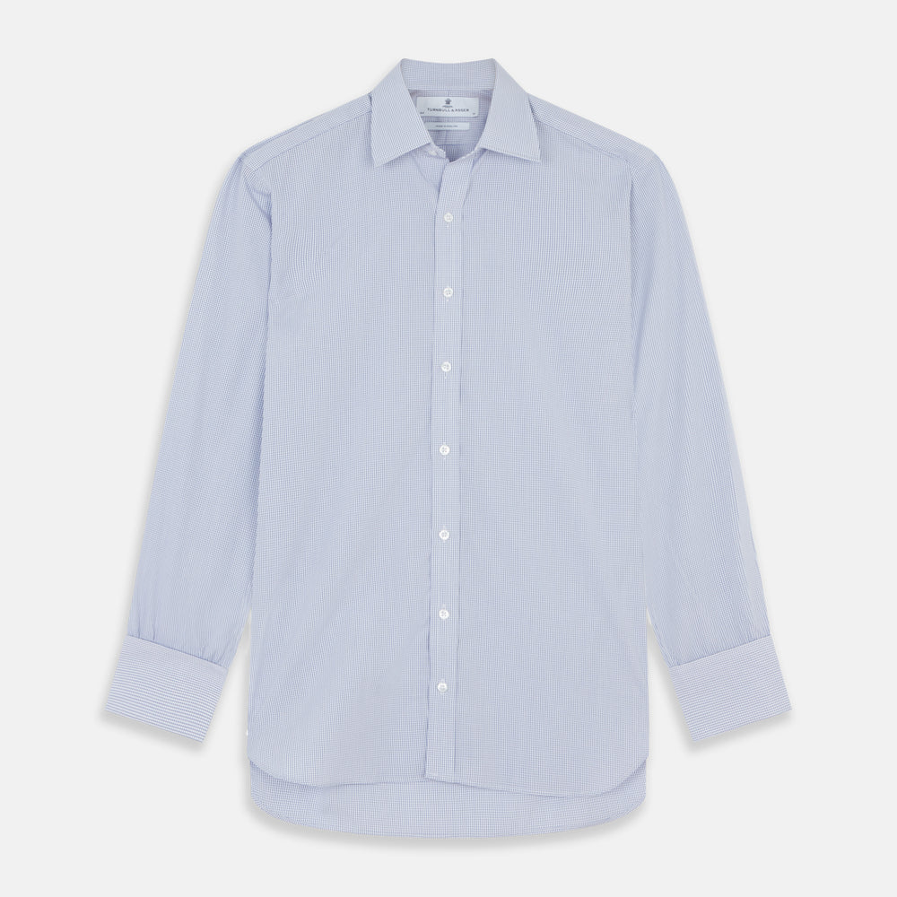 The Blue Grid Check Shirt by Turnbull & Asser features a T&A collar and double cuffs. This cotton long-sleeve shirt has an ultra-fine blue and white grid pattern and is displayed flat on a white background.