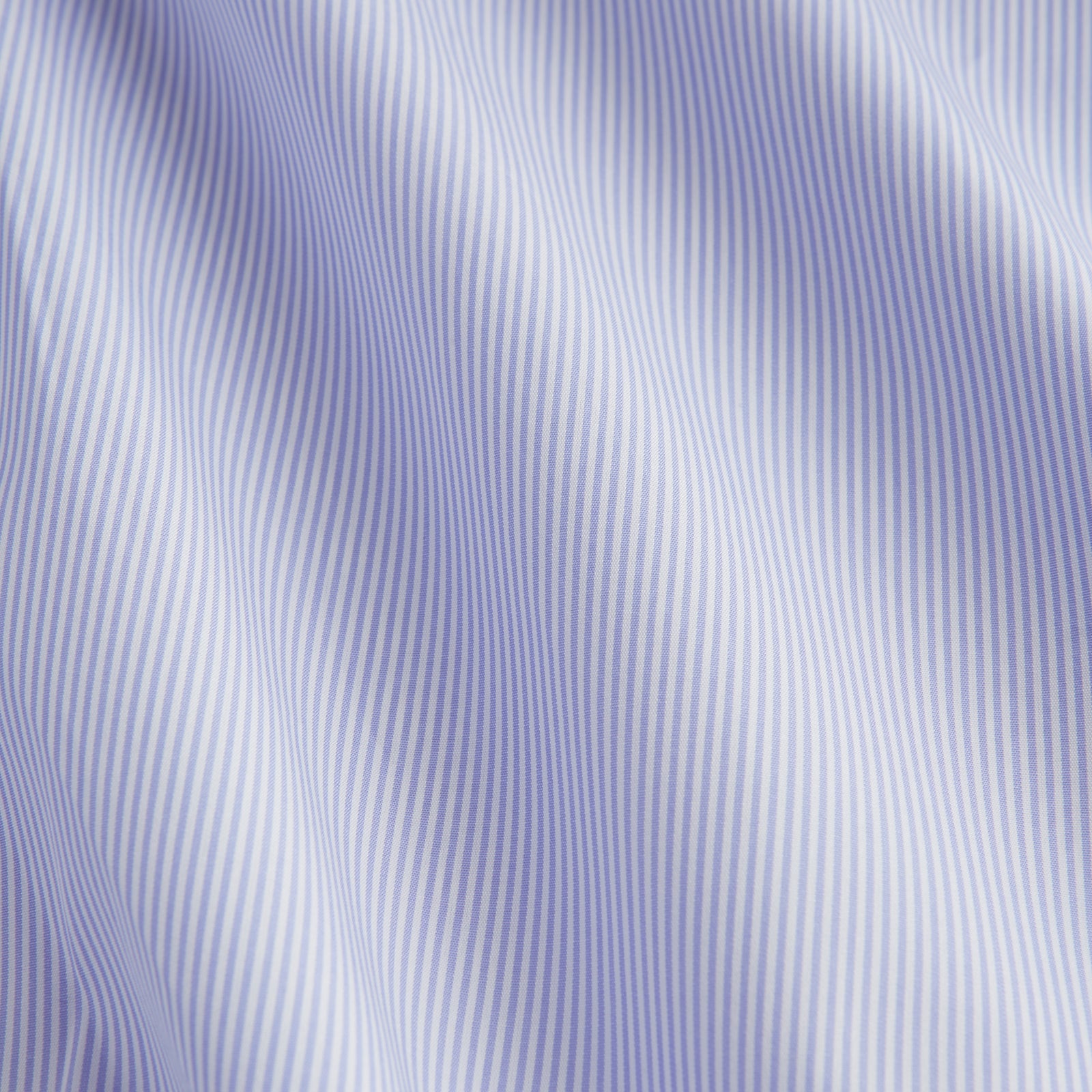 View 4 of product Turnbull & Asser Blue and White Fine Bengal Stripe Sea Island Quality Cotton Shirt featuring a T&A collar and double cuffs, crafted from premium Egyptian cotton.