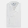 View 4 of product The Turnbull & Asser Plain White Cotton Shirt features a T&A collar, double cuffs, and a straight hem—ideal for minimalist style. Displayed on a plain white background.
