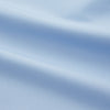 View 4 of product The Turnbull & Asser Pale Blue Organic Cotton Regular Fit Mayfair Shirt features long sleeves, a pointed collar, white buttons, and buttoned cuffs, shown laid flat on a white background.