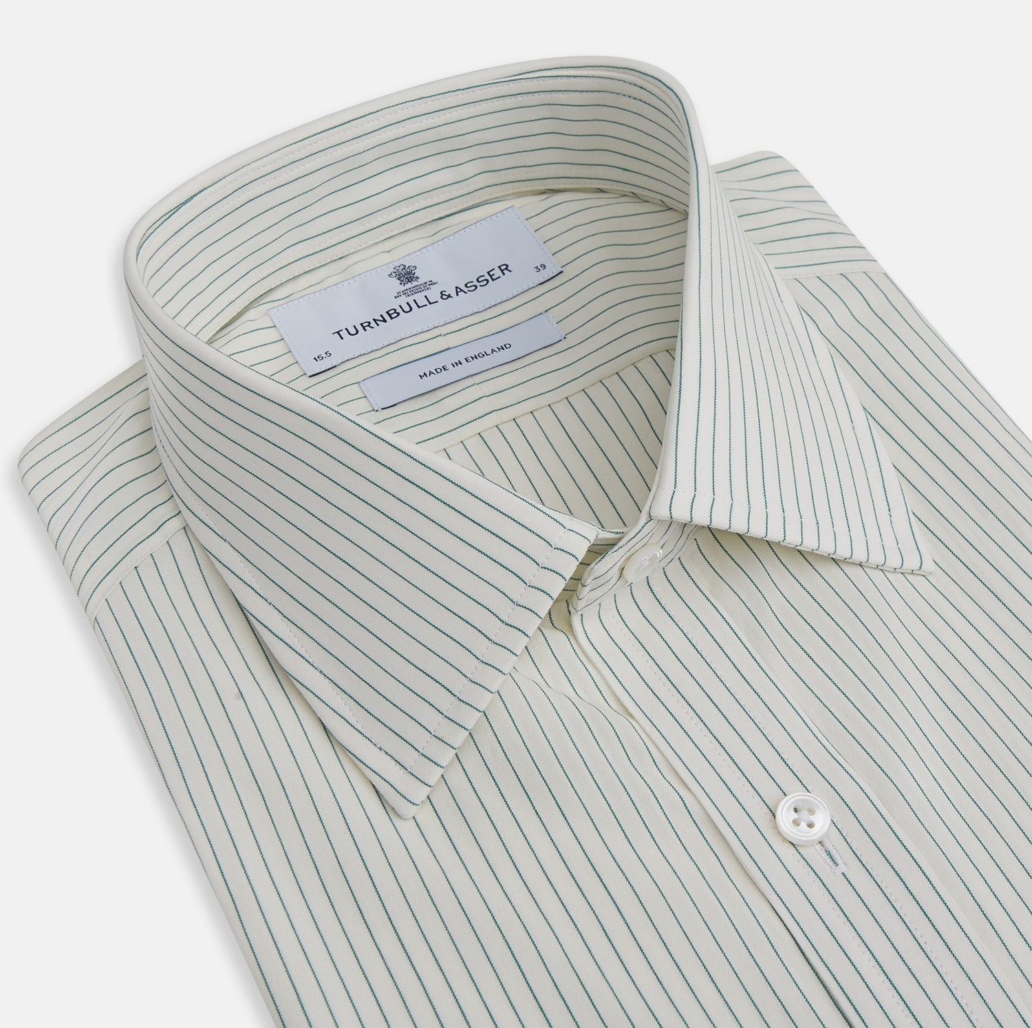 View 2 of product The Turnbull & Asser Dark Green Pinstripe Mayfair Shirt is a long-sleeve, button-up with a classic collar, crafted from organic cotton and featuring thin vertical white and dark green stripes, shown flat on a white background.