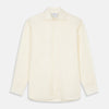 View 1 of product The Turnbull & Asser Tailored Fit Cream Cotton Shirt features a Kent collar and 3-button cuffs—a versatile minimalist choice, ideal on its own or paired with statement ties.