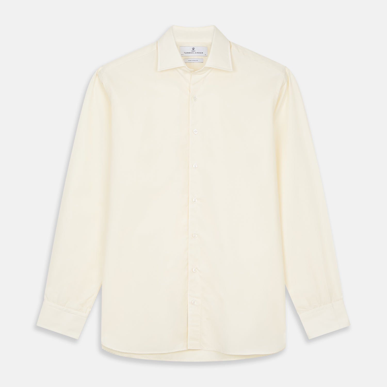 View 1 of product The Turnbull & Asser Tailored Fit Cream Cotton Shirt features a Kent collar and 3-button cuffs—a versatile minimalist choice, ideal on its own or paired with statement ties.