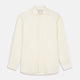 The Turnbull & Asser Tailored Fit Cream Cotton Shirt features a Kent collar and 3-button cuffs—a versatile minimalist choice, ideal on its own or paired with statement ties.