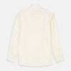 View 5 of product The Turnbull & Asser Tailored Fit Cream Cotton Shirt features a Kent collar and double cuffs, shown laid flat against a white background—ideal for pairing with statement ties.