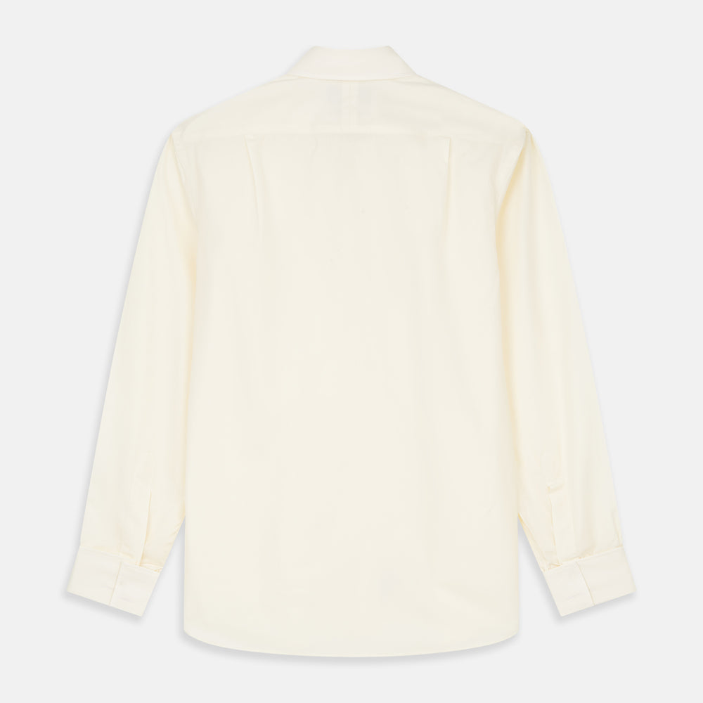 The Turnbull & Asser Tailored Fit Cream Cotton Shirt features a Kent collar and double cuffs, shown laid flat against a white background—ideal for pairing with statement ties.