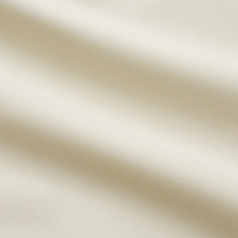 The Turnbull & Asser Tailored Fit Cream Cotton Shirt features a Kent collar and double cuffs, shown laid flat against a white background—ideal for pairing with statement ties.
