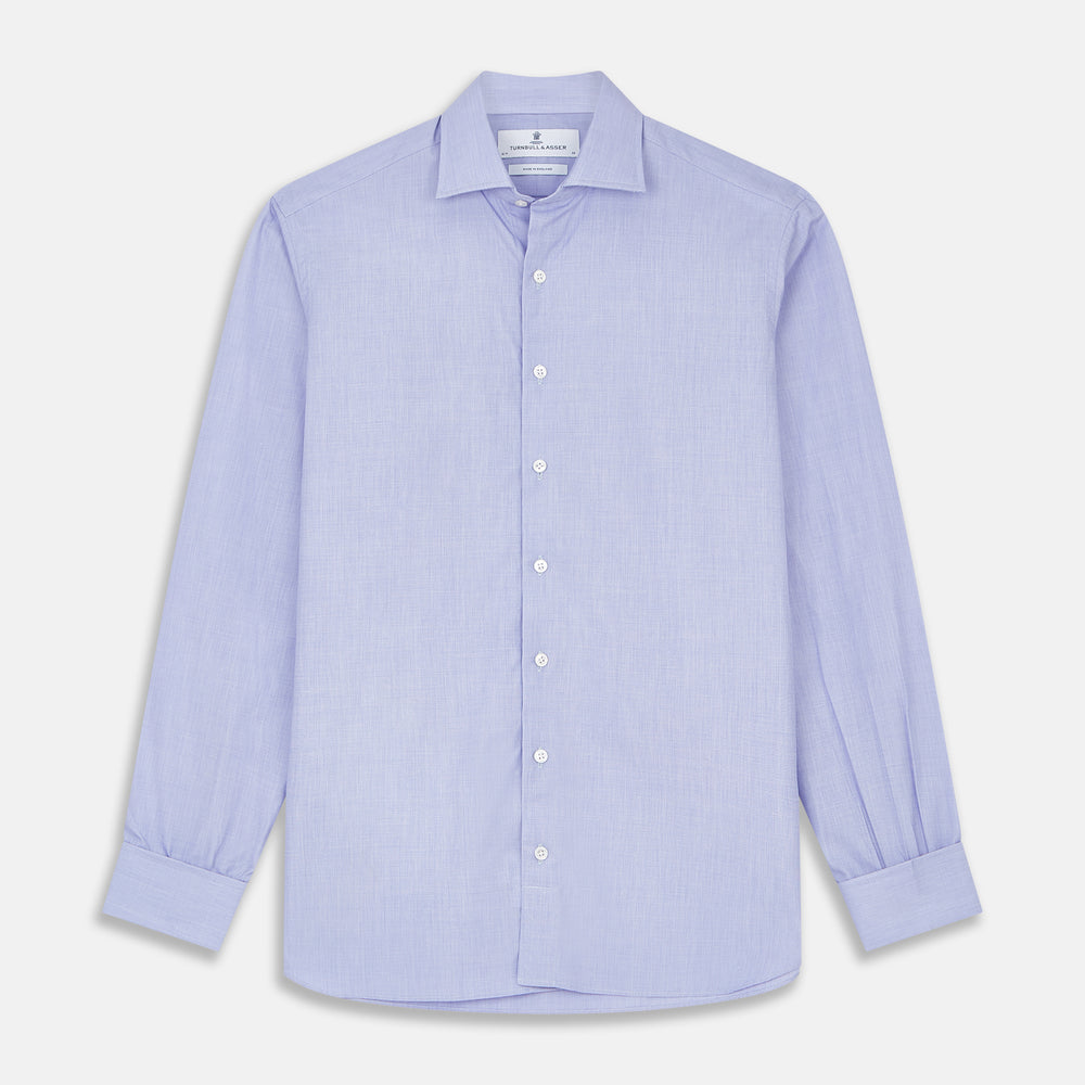 The Turnbull & Asser Tailored Fit Blue End-on-End Cotton Shirt features a Kent collar and double cuffs—ideal for pairing with a navy suit for a sharp look. Laid flat on a white background.