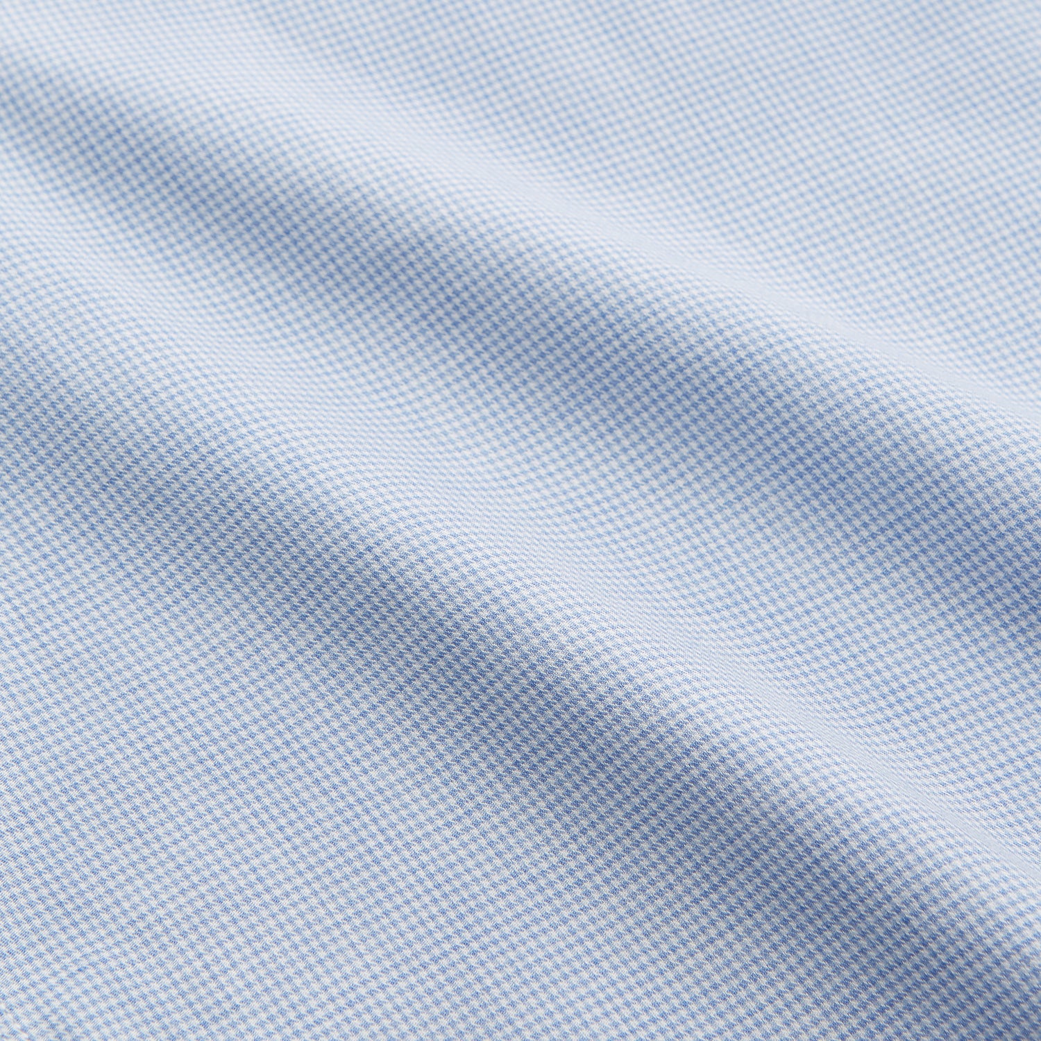 View 4 of product The Blue Weekend Fit Cotton-Cashmere Finch Shirt by Turnbull & Asser features a derby collar, chest pocket, and long sleeves—ideal for casual style from the Weekend Fit collection. Laid flat on white; comfortable and refined.