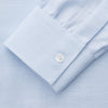 View 3 of product The Turnbull & Asser Plain Blue Weekend Fit Chambray Finch Shirt features a Derby collar, long sleeves, and a front chest pocket—shown laid flat on white—ideal for casual weekend wear.