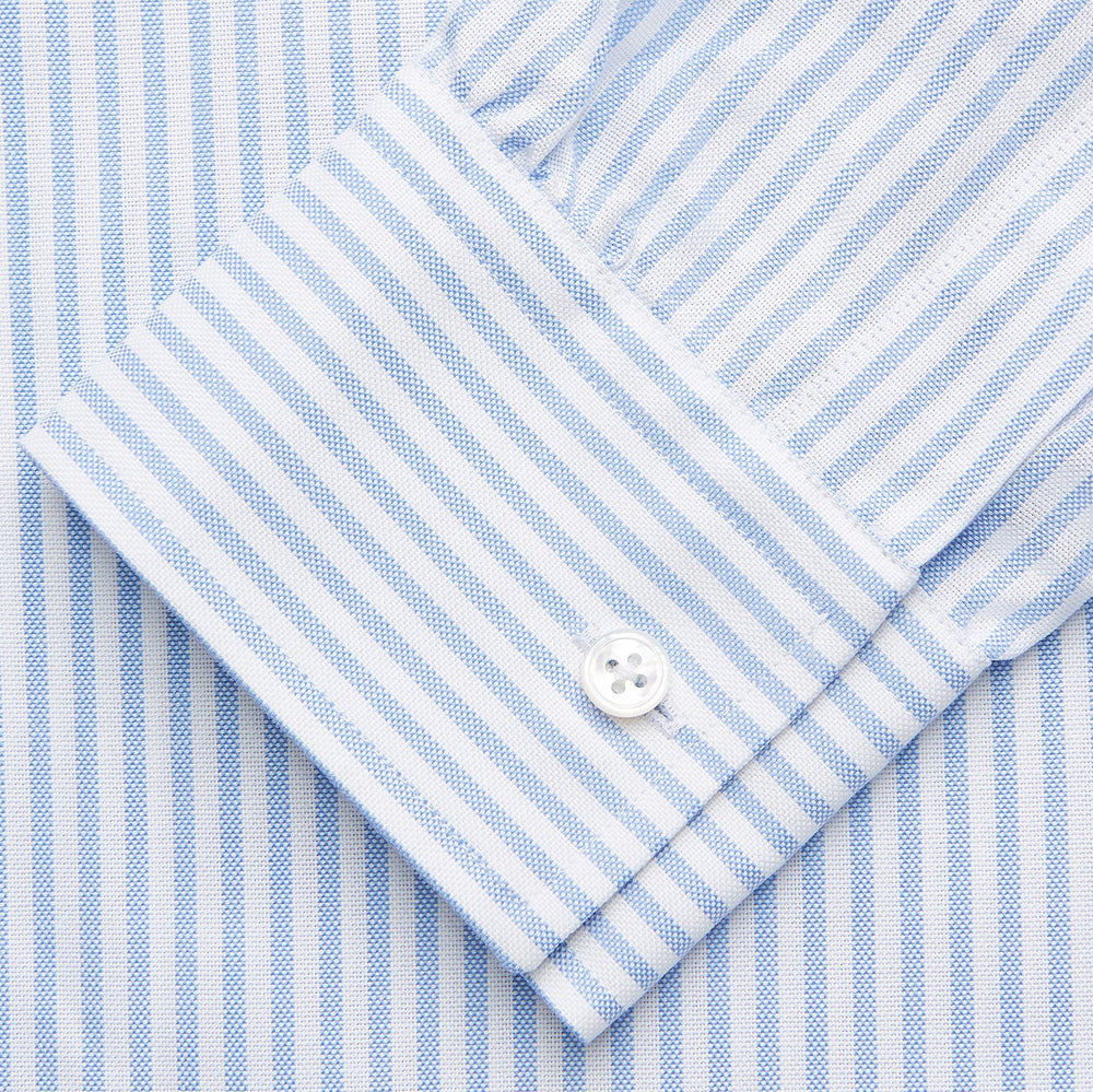 The Turnbull & Asser Pale Blue Stripe Weekend Fit Hayne Shirt features a Dorset collar, 1-button cuffs, and is displayed flat on a white background—ideal for those seeking our relaxed Weekend Fit style.