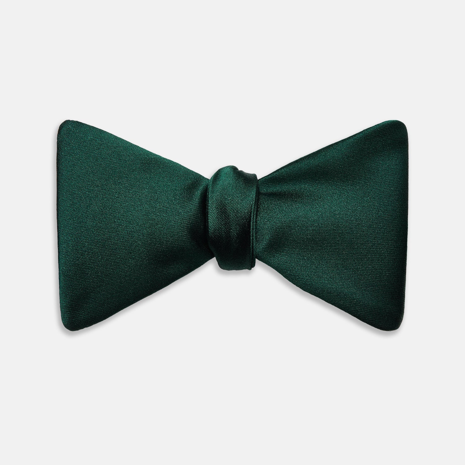 View 1 of product The Turnbull & Asser Forest Green Plain Satin Silk Bow Tie is neatly tied and displayed against a plain white background.