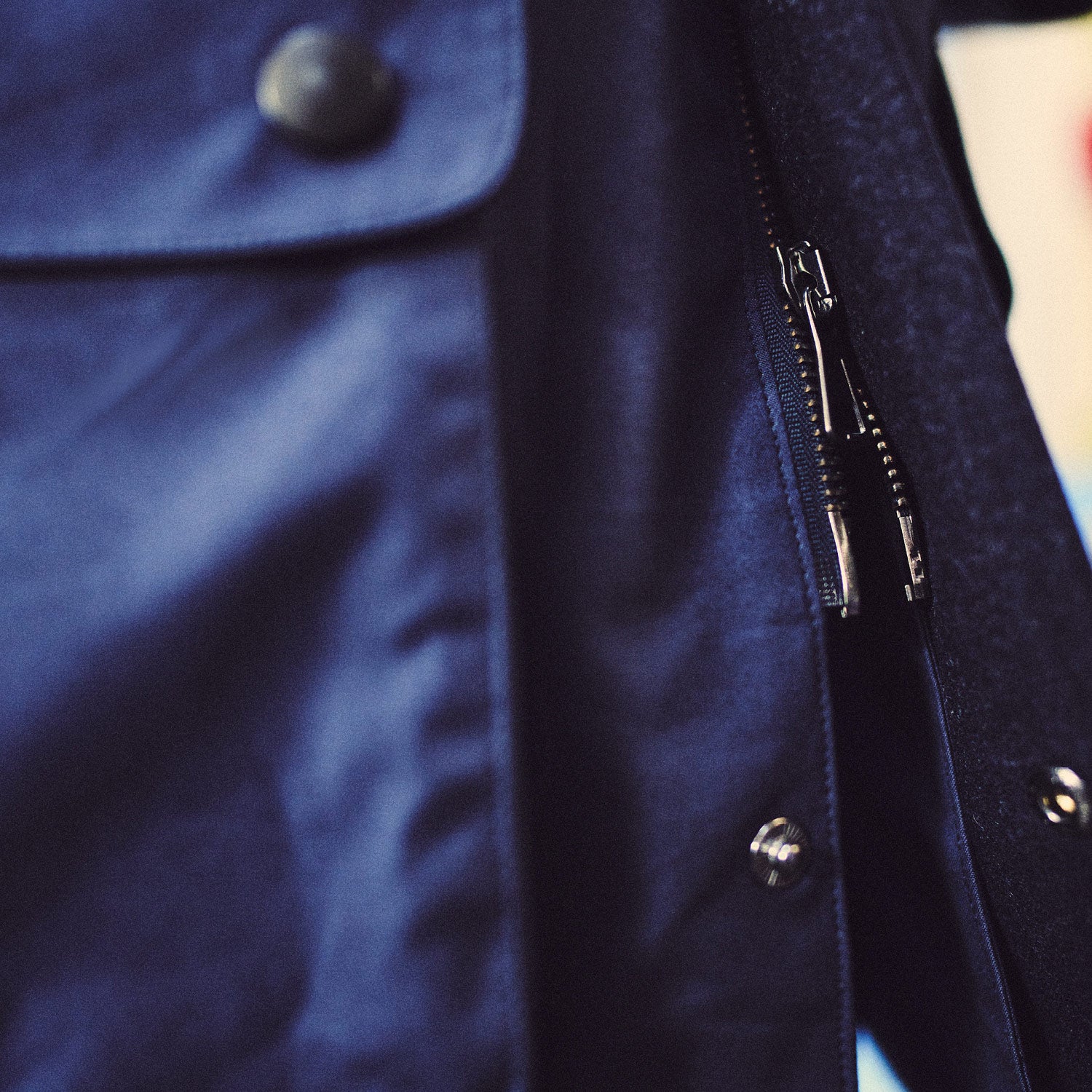 View 5 of product The Turnbull & Asser Navy Dry-Waxed Cotton Field Jacket features a collar, front zipper with snap buttons, two chest pockets, and large hip flap pockets, shown laid flat on a plain white background.