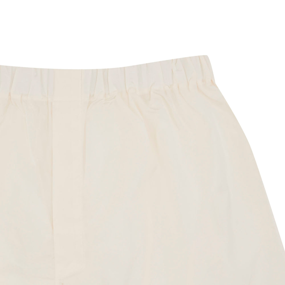 Turnbull & Asser Cream Sea Island Quality Cotton Boxer Shorts for men, featuring an elastic waistband, are shown on a white background.