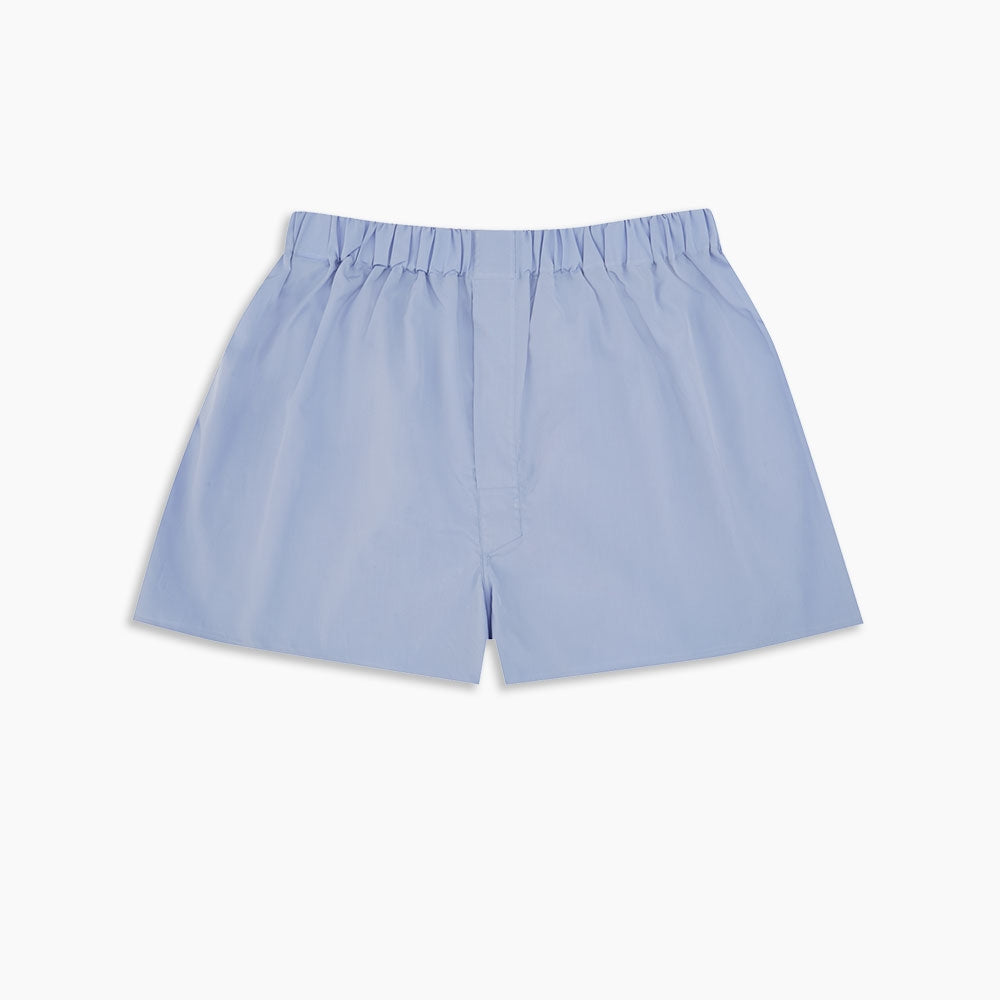 Turnbull & Asser Plain Blue Sea Island Quality Cotton Boxer Shorts feature premium soft cotton and an elastic waistband, shown flat against a white background.
