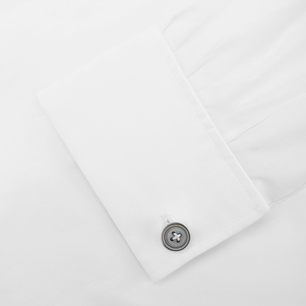 Turnbull & Asser's Smoke Sterling Silver Mother-of-Pearl Button Cufflinks feature a round, button-inspired design with a dark iridescent center and four holes, showcasing British style against a plain white background.