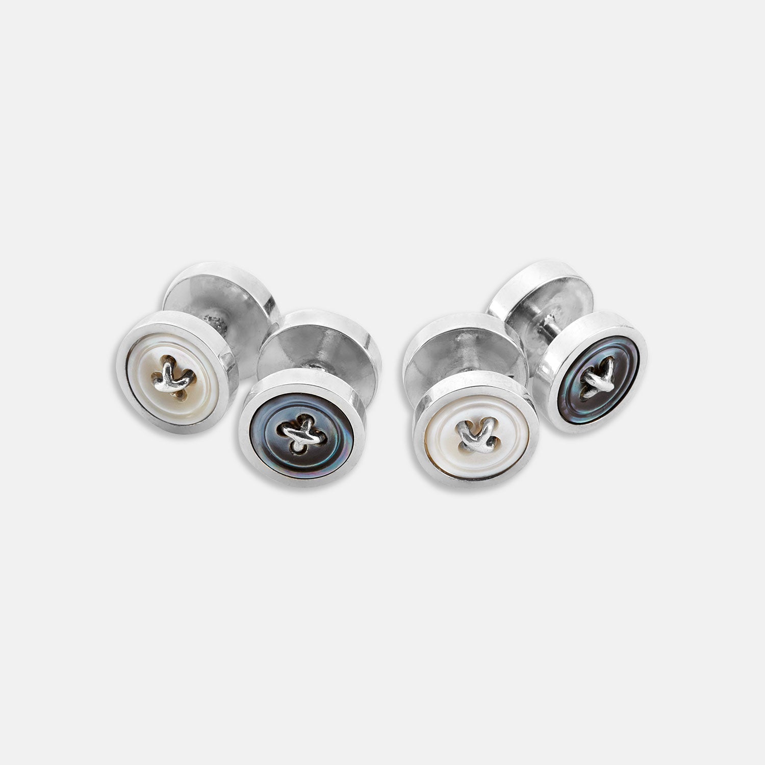 View 1 of product Reversible White and Smoke Mother-of-Pearl Dress Studs by Turnbull & Asser, featuring round faces with light and dark tones—ideal for pairing with onyx cufflinks or silver accessories.