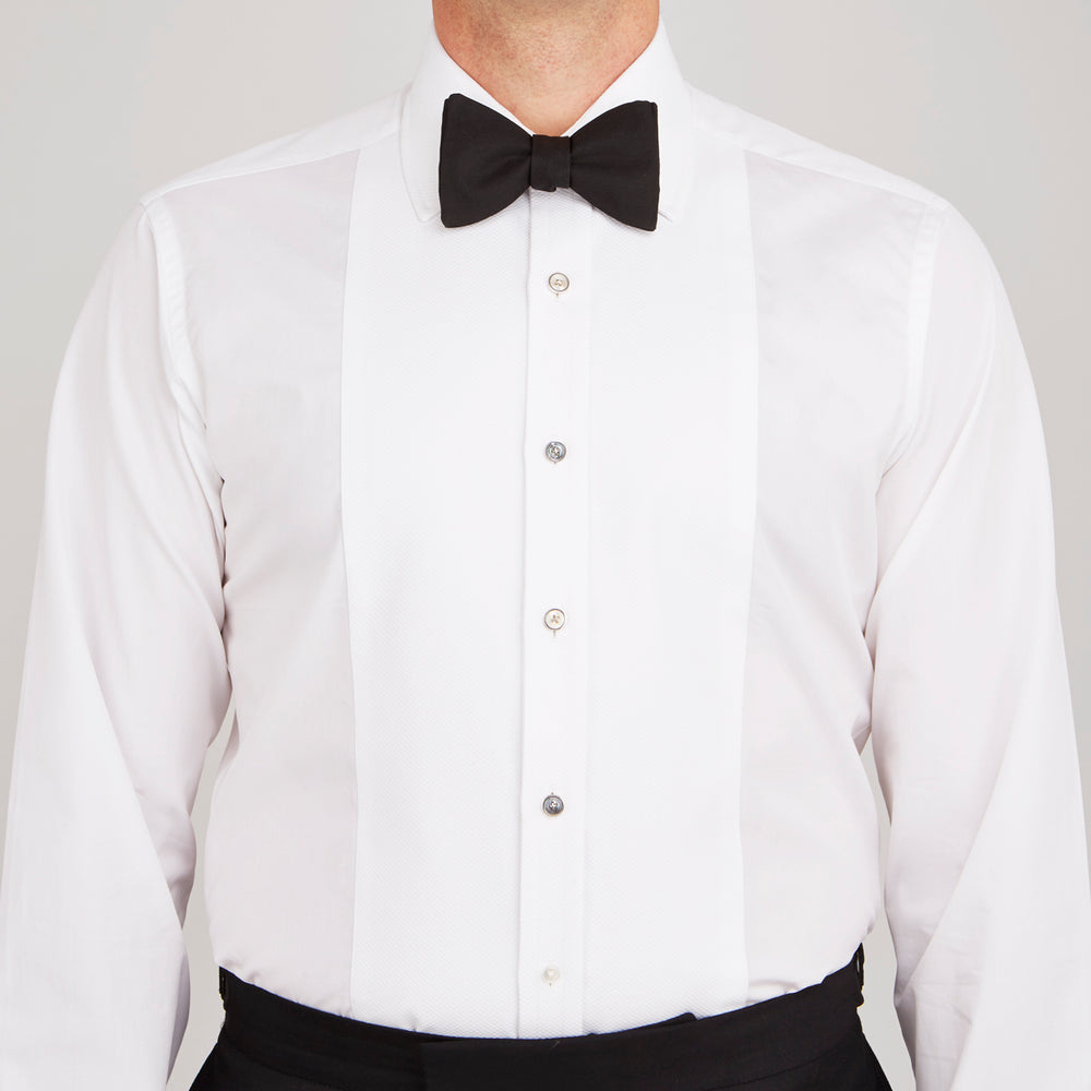 Reversible White and Smoke Mother-of-Pearl Dress Studs by Turnbull & Asser, featuring round faces with light and dark tones—ideal for pairing with onyx cufflinks or silver accessories.