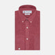 The Turnbull & Asser Weekend Fit Red Linen Shirt features a Dorset collar, 1-button cuff, white buttons, and patch pocket. The long-sleeve shirt is neatly folded and displayed on a plain white background.