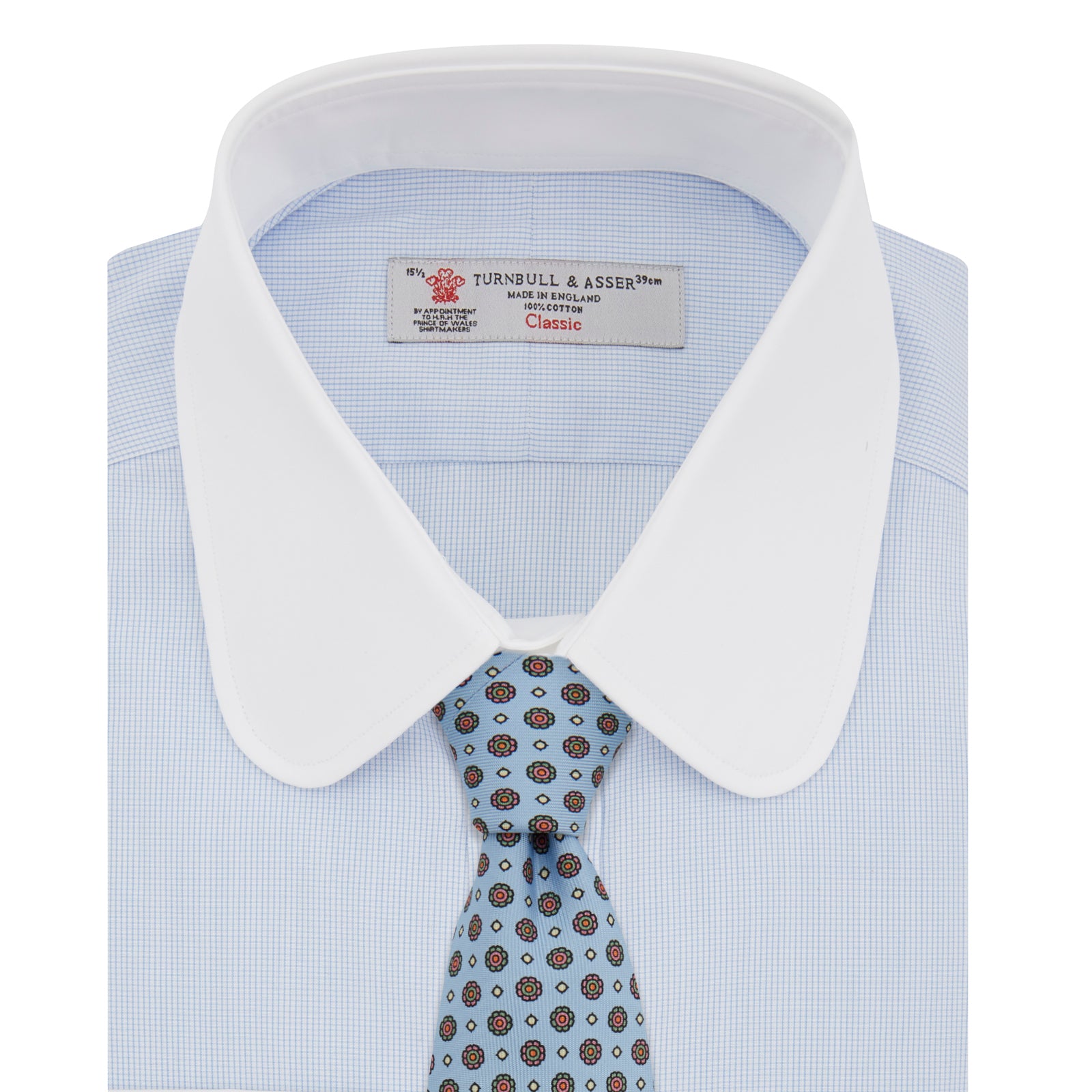 View 4 of product A neatly folded The Great Gatsby Cotton Shirt by Turnbull & Asser, featuring a light blue body, white rounded collar, and double cuffs inspired by 1920s style, displayed on a plain light background.