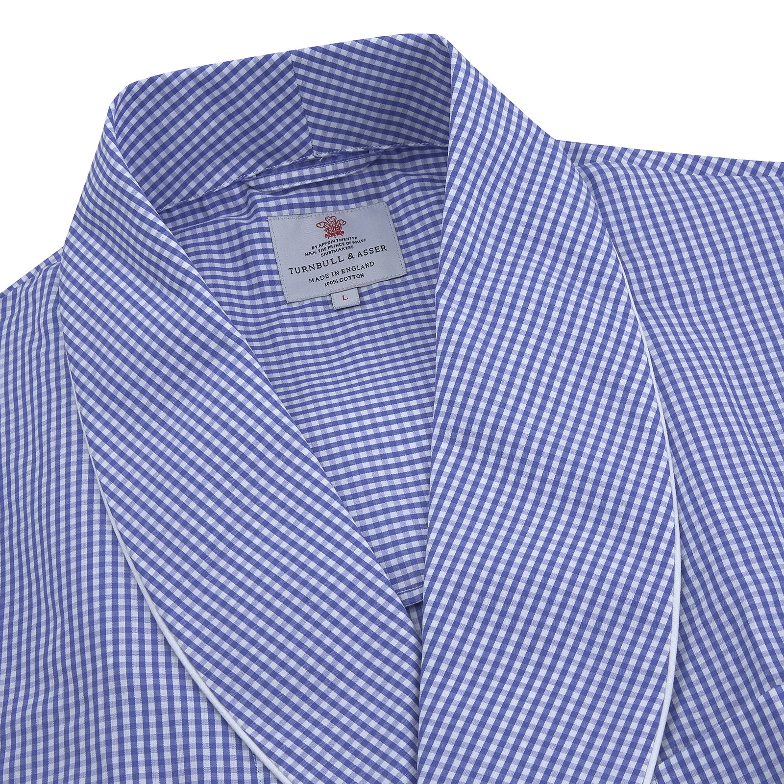 View 2 of product The Turnbull & Asser Mid Blue Gingham Check Piped Cotton Gown, featuring a shawl collar and tied belt, is elegantly displayed against a white background.