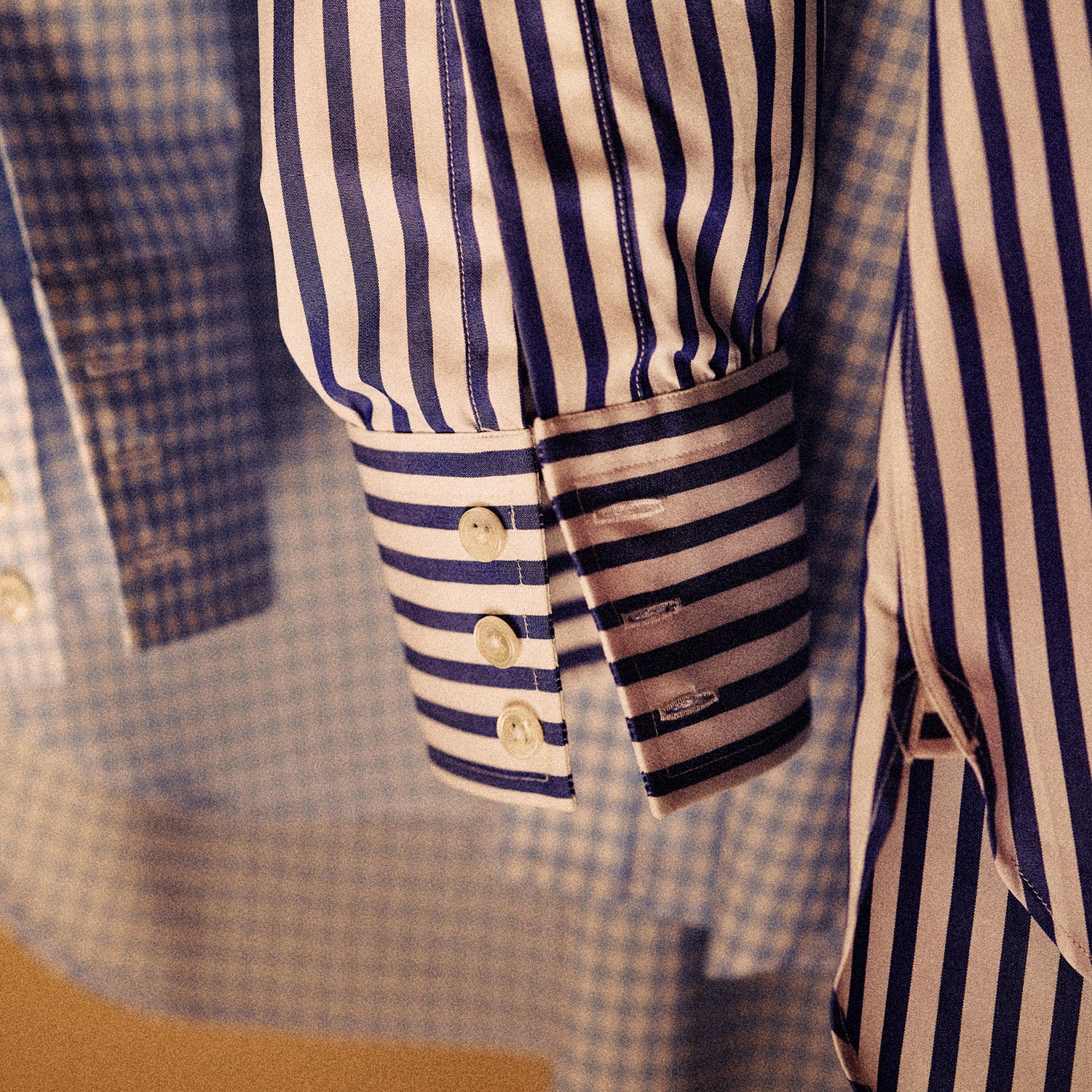 View 2 of product The Turnbull & Asser Blue and White Wide Stripe Shirt features a T&A collar and 3-button cuffs—its bold vertical stripes make it perfect for office wear, shown here on a white background.
