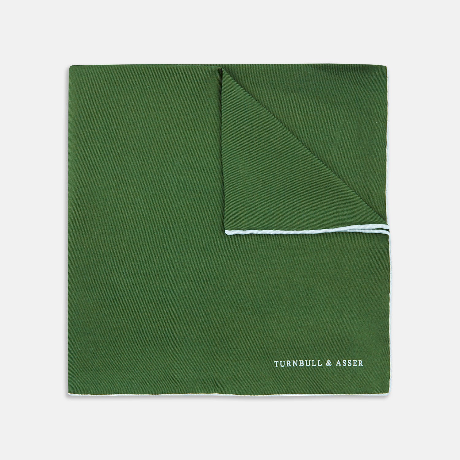 View 1 of product The Olive and White Piped Silk Pocket Square by Turnbull & Asser features a subtle white border and the brand’s embroidered logo—a timeless accessory for any occasion.