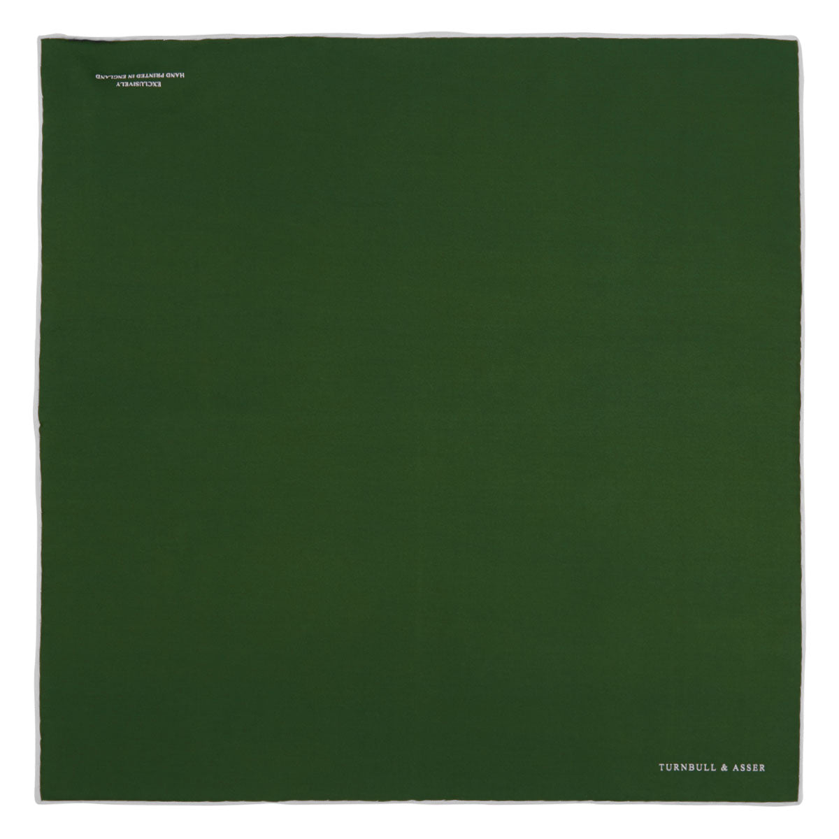 View 2 of product The Olive and White Piped Silk Pocket Square by Turnbull & Asser features a subtle white border and the brand’s embroidered logo—a timeless accessory for any occasion.