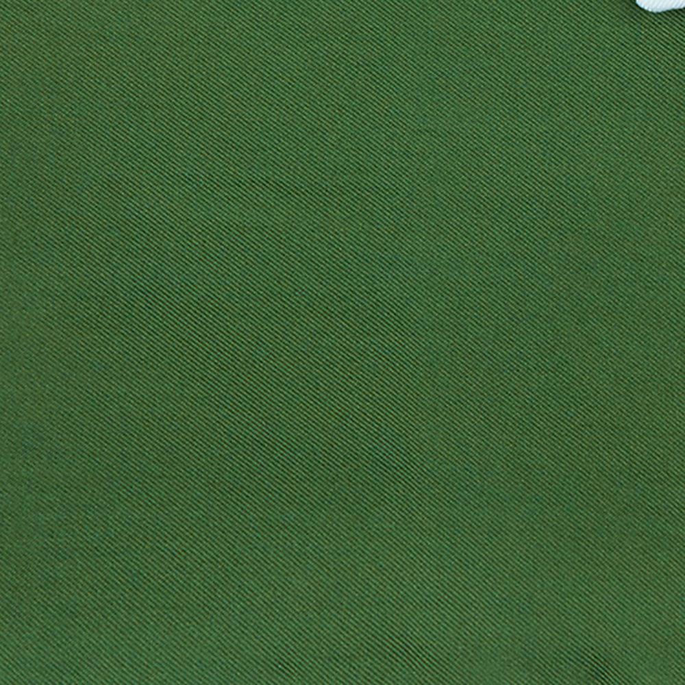 The Olive and White Piped Silk Pocket Square by Turnbull & Asser features a subtle white border and the brand’s embroidered logo—a timeless accessory for any occasion.