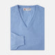 A Sky Blue Fine Cashmere V-Neck Jumper by Turnbull & Asser, neatly folded with visible ribbed collar and cuff, is displayed on a white background. The label appears inside the collar.