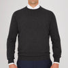 View 3 of product The Charcoal Crew Neck Cashmere Jumper by Turnbull & Asser is a luxury, long-sleeved sweater crafted from Scottish cashmere and shown on a white background.