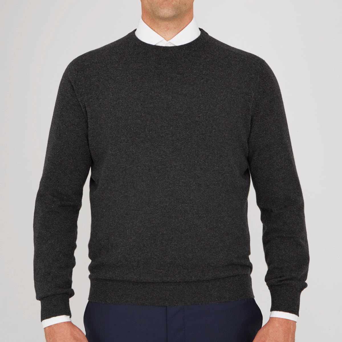View 3 of product The Charcoal Crew Neck Cashmere Jumper by Turnbull & Asser is a luxury, long-sleeved sweater crafted from Scottish cashmere and shown on a white background.