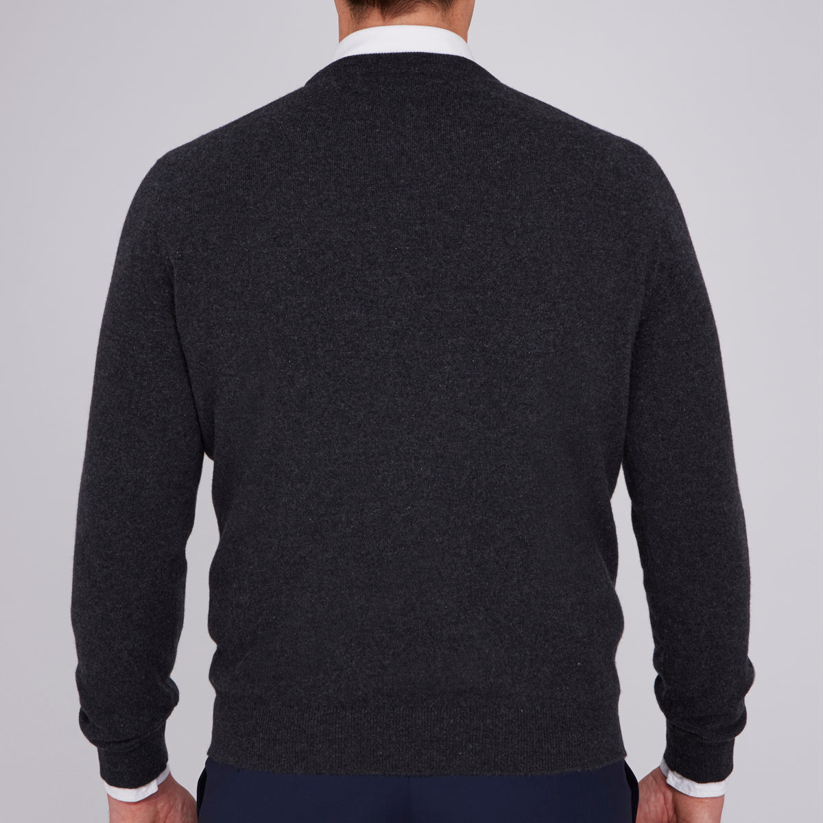 View 4 of product The Charcoal Crew Neck Cashmere Jumper by Turnbull & Asser is a luxury, long-sleeved sweater crafted from Scottish cashmere and shown on a white background.
